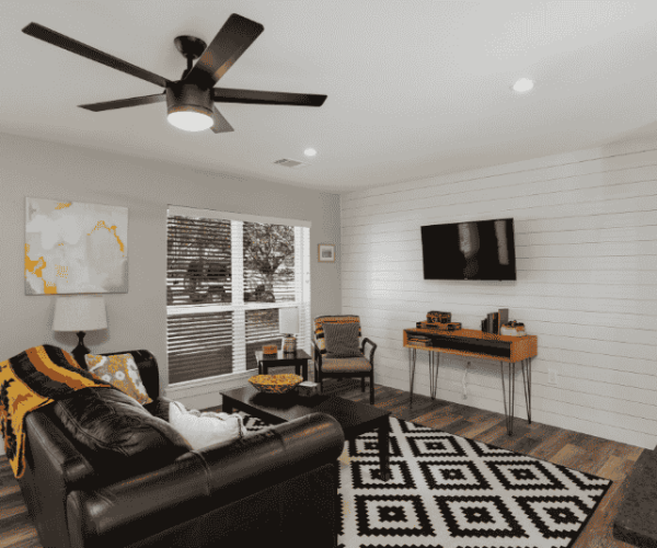 High-quality interior painting services in Austin showing a bright, freshly painted living room.